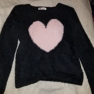Sweater with a pink heart on the front